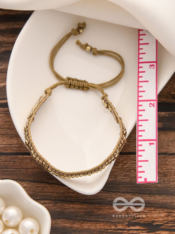 The Golden Glimmer- Beaded Knot Bracelet