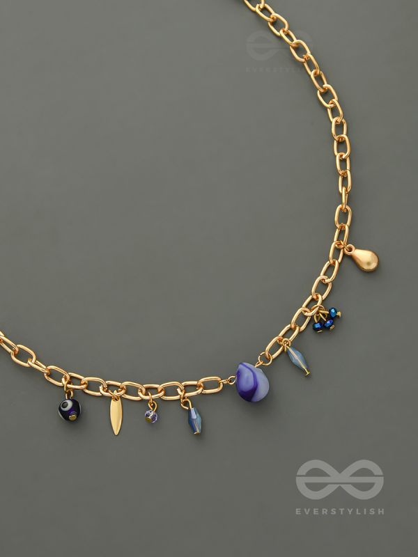 Fragments of the Sky- Blue Crystals Studded Golden Necklace