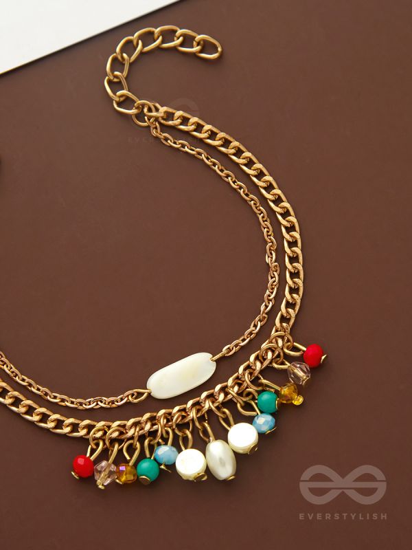 The Divine Galaxy- Pearls and Beads Studded Golden Bracelet