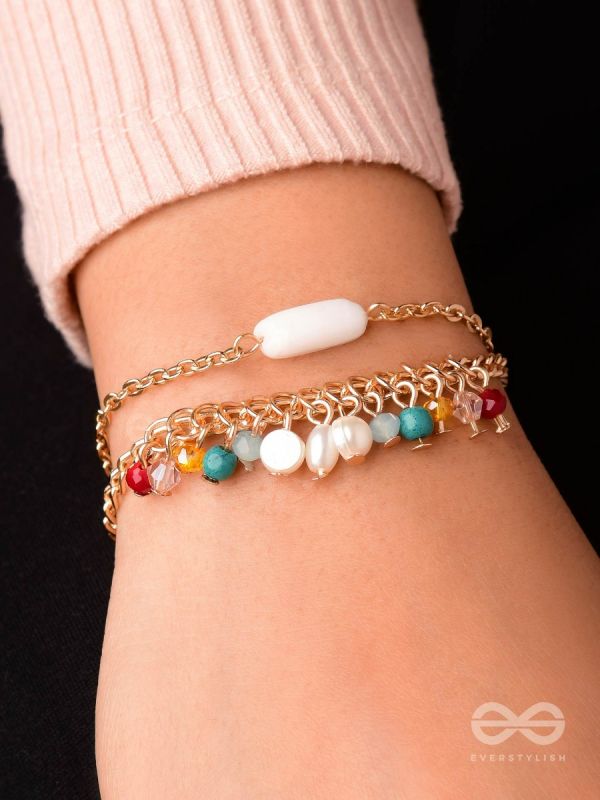 The Divine Galaxy- Pearls and Beads Studded Golden Bracelet