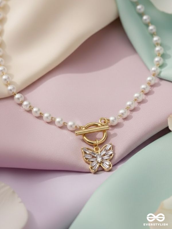 A FLYING MIRACLE - GOLDEN PEARL NECKPIECE