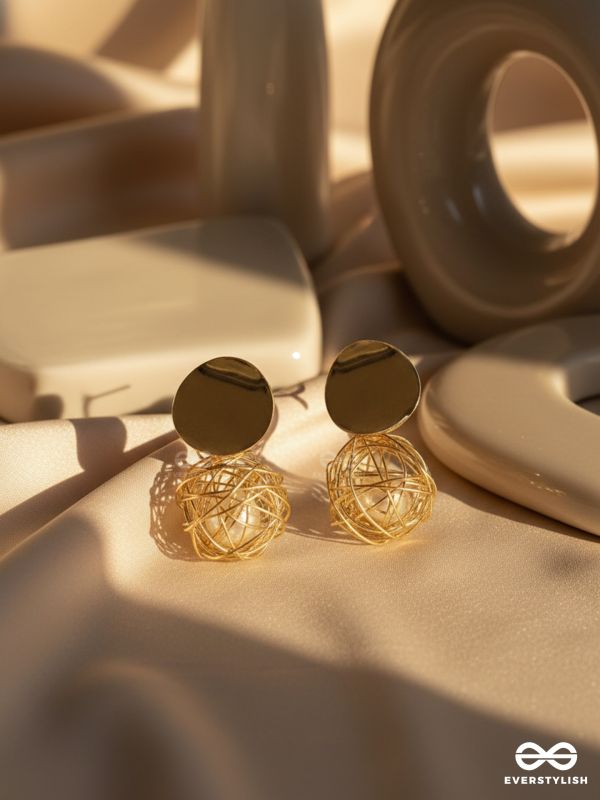 Mirror reflection- pearl in a cage of gold earrings