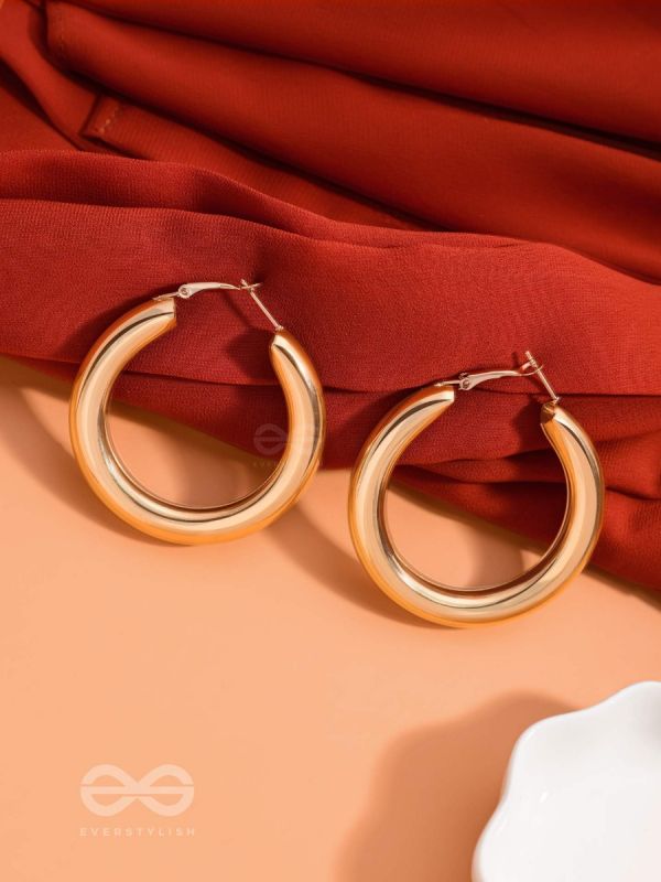 A Fashionista’s Dream - Glittering gold loops