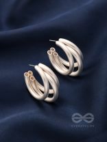 THE ELEGANT TURNS - MATTE FINISHED SILVER HOOPS