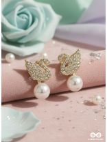 CELESTE SWAN – RADIANT WINGED STUDS WITH A CLASSIC PEARL DROP