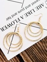 The Shimmery Circles - Golden Elegant Earrings