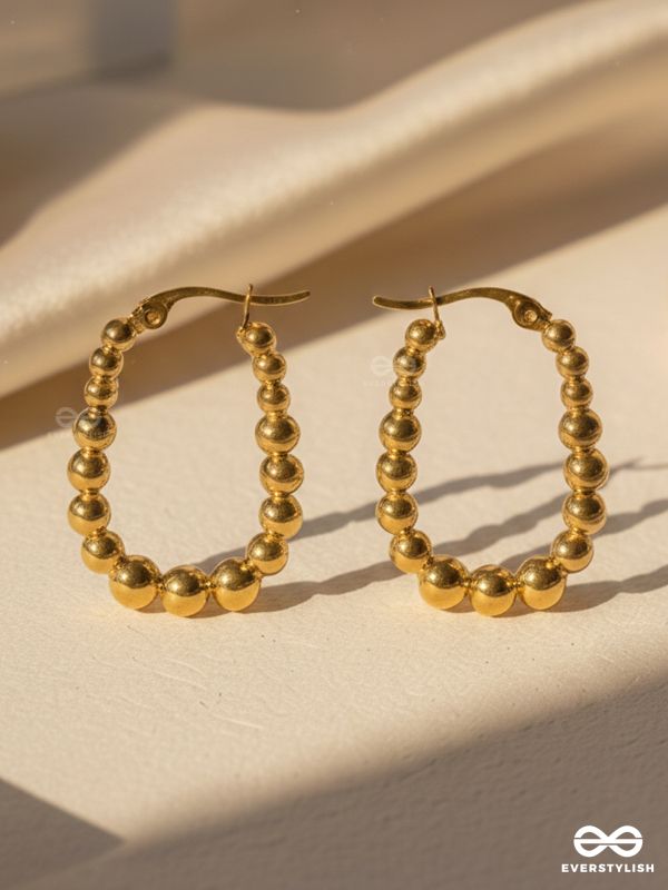 SUNBURST HOOPS – DELICATE DROP-SHAPED STAINLESS STEEL EARRINGS